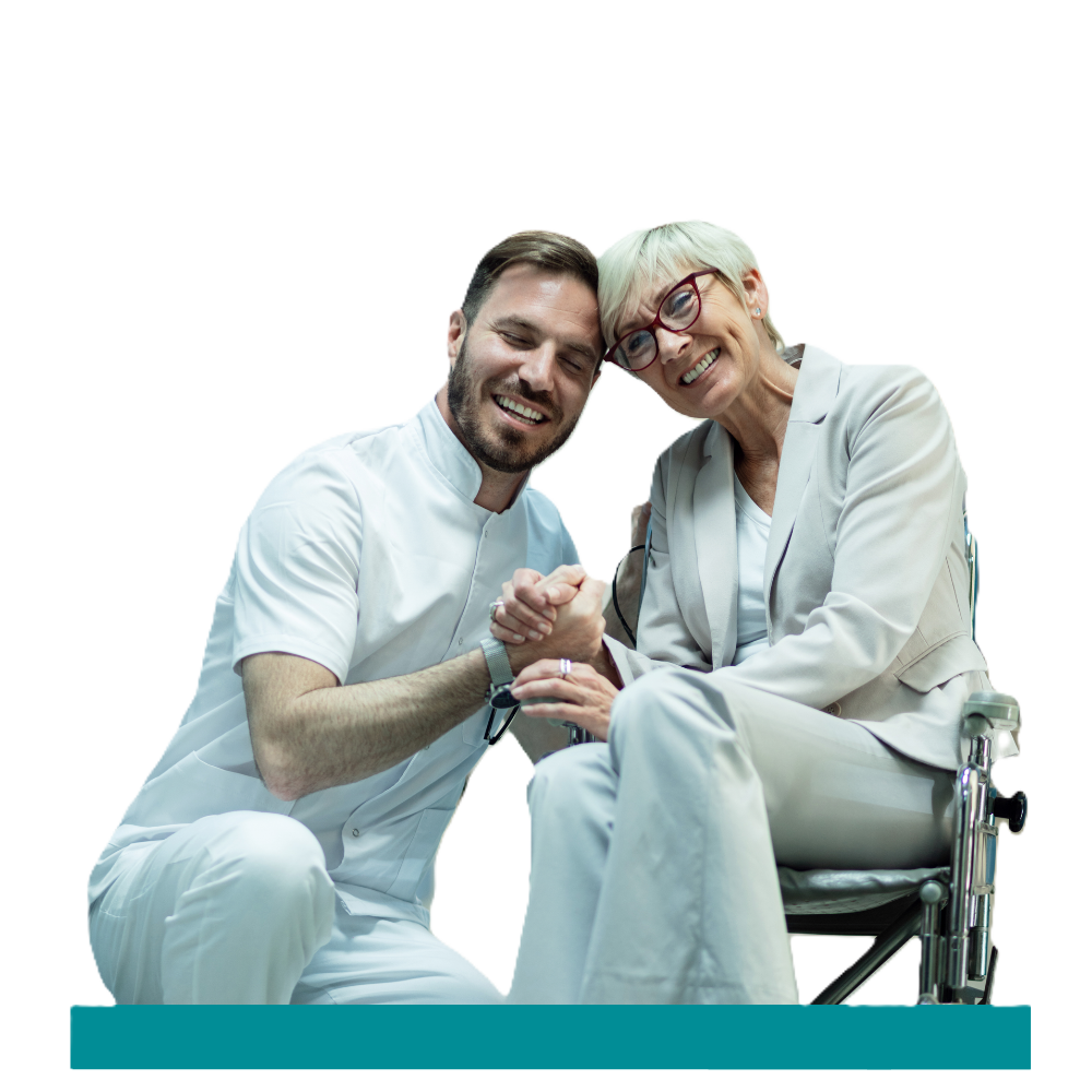 Caregiver sitting with a senior woman in a wheelchair, providing in-home senior care in the Tampa Area, FL